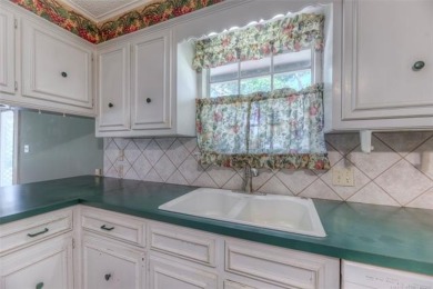 Discover the potential in this spacious 2-story ranch style home on The Canyons At Blackjack Ridge in Oklahoma - for sale on GolfHomes.com, golf home, golf lot