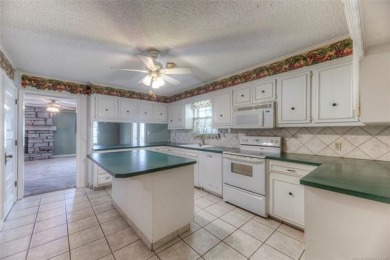 Discover the potential in this spacious 2-story ranch style home on The Canyons At Blackjack Ridge in Oklahoma - for sale on GolfHomes.com, golf home, golf lot