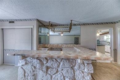 Discover the potential in this spacious 2-story ranch style home on The Canyons At Blackjack Ridge in Oklahoma - for sale on GolfHomes.com, golf home, golf lot