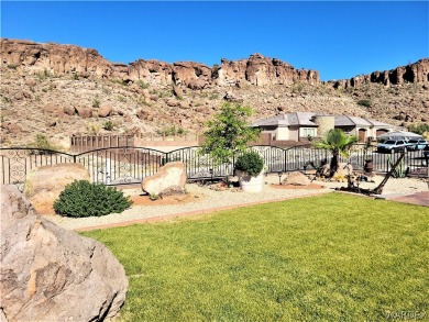 Nestled next to Cerbat Cliffs Golf Course, this executive home on Cerbat Cliffs Golf Course in Arizona - for sale on GolfHomes.com, golf home, golf lot