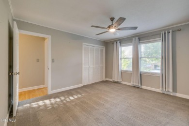 Welcome home to this one level brick beauty with a basement! on Johnson City Country Club in Tennessee - for sale on GolfHomes.com, golf home, golf lot