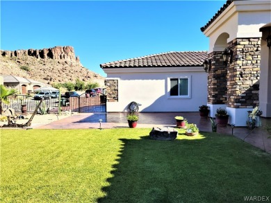 Nestled next to Cerbat Cliffs Golf Course, this executive home on Cerbat Cliffs Golf Course in Arizona - for sale on GolfHomes.com, golf home, golf lot