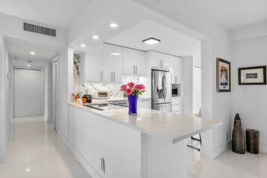 Pristine, fully renovated 2BD/2BA plus den penthouse in Boca on Boca Pointe Country Club in Florida - for sale on GolfHomes.com, golf home, golf lot