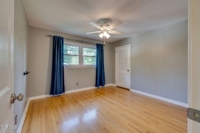 Welcome home to this one level brick beauty with a basement! on Johnson City Country Club in Tennessee - for sale on GolfHomes.com, golf home, golf lot