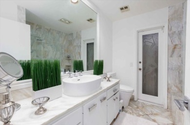 UNIQUE SINGLE FAMILY HOME 4 BEDROOMS/3.5 BATHROOMS IN PALM AIRE on Oaks Country Club in Florida - for sale on GolfHomes.com, golf home, golf lot