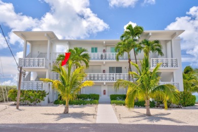 Step into a piece of 1960's Keys nostalgia with this on Key Colony Beach Golf Course in Florida - for sale on GolfHomes.com, golf home, golf lot