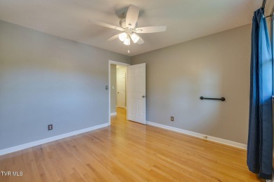 Welcome home to this one level brick beauty with a basement! on Johnson City Country Club in Tennessee - for sale on GolfHomes.com, golf home, golf lot