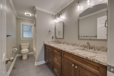 Welcome home to this one level brick beauty with a basement! on Johnson City Country Club in Tennessee - for sale on GolfHomes.com, golf home, golf lot