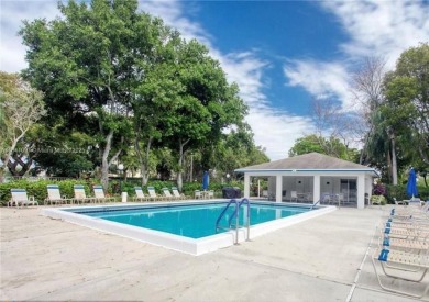 UNIQUE SINGLE FAMILY HOME 4 BEDROOMS/3.5 BATHROOMS IN PALM AIRE on Oaks Country Club in Florida - for sale on GolfHomes.com, golf home, golf lot