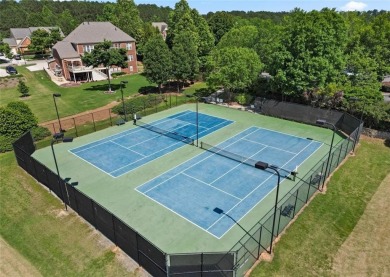 Discover the perfect blend of elegance and comfort in this on Canongate At Heron Bay in Georgia - for sale on GolfHomes.com, golf home, golf lot