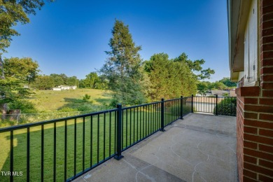 Welcome home to this one level brick beauty with a basement! on Johnson City Country Club in Tennessee - for sale on GolfHomes.com, golf home, golf lot