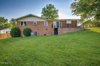 Welcome home to this one level brick beauty with a basement! on Johnson City Country Club in Tennessee - for sale on GolfHomes.com, golf home, golf lot