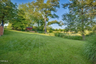 Welcome home to this one level brick beauty with a basement! on Johnson City Country Club in Tennessee - for sale on GolfHomes.com, golf home, golf lot