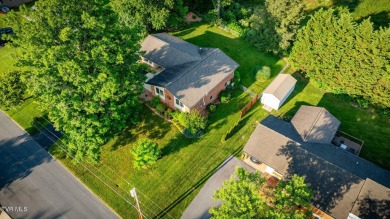 Welcome home to this one level brick beauty with a basement! on Johnson City Country Club in Tennessee - for sale on GolfHomes.com, golf home, golf lot