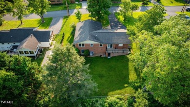 Welcome home to this one level brick beauty with a basement! on Johnson City Country Club in Tennessee - for sale on GolfHomes.com, golf home, golf lot