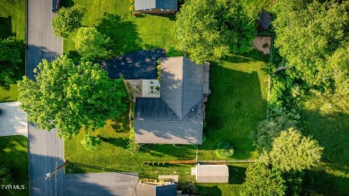 Welcome home to this one level brick beauty with a basement! on Johnson City Country Club in Tennessee - for sale on GolfHomes.com, golf home, golf lot