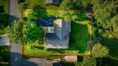 Welcome home to this one level brick beauty with a basement! on Johnson City Country Club in Tennessee - for sale on GolfHomes.com, golf home, golf lot