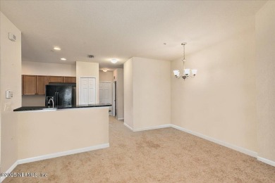 ATTENTION INVESTORS! Ground-floor, 3-bedroom corner unit with on The Palencia Club in Florida - for sale on GolfHomes.com, golf home, golf lot