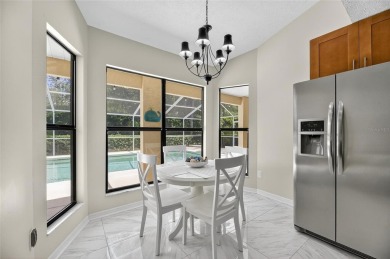 SIZZLING....THIS POOL HOME IS A WINNER --Located in the inviting on River Hills Country Club in Florida - for sale on GolfHomes.com, golf home, golf lot