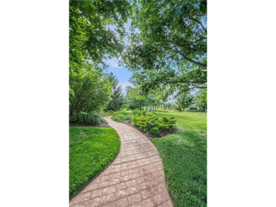 This exquisite 4 bed/4.5 bath home is perfectly placed on the #7 on Nicklaus Golf Club At LionsGate in Kansas - for sale on GolfHomes.com, golf home, golf lot