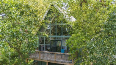 This charming tucked away A-Frame style house is located in the on Hide-A-Way Lake Golf Course in Texas - for sale on GolfHomes.com, golf home, golf lot