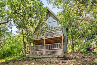 This charming tucked away A-Frame style house is located in the on Hide-A-Way Lake Golf Course in Texas - for sale on GolfHomes.com, golf home, golf lot