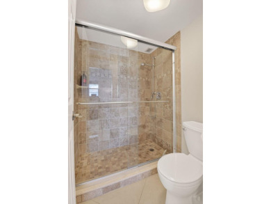 Pristine and fully updated, this penthouse-level 1-bedroom on Ocean Breeze Golf and Country Club in Florida - for sale on GolfHomes.com, golf home, golf lot