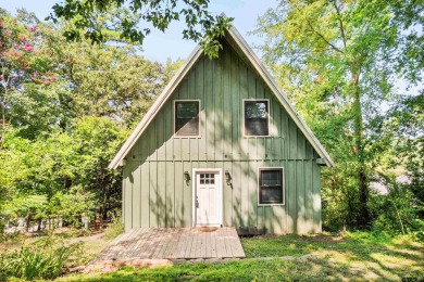 This charming tucked away A-Frame style house is located in the on Hide-A-Way Lake Golf Course in Texas - for sale on GolfHomes.com, golf home, golf lot