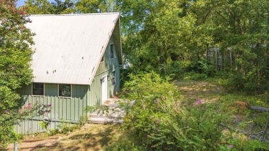 This charming tucked away A-Frame style house is located in the on Hide-A-Way Lake Golf Course in Texas - for sale on GolfHomes.com, golf home, golf lot