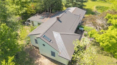 Set in the hills of Collins, this delightful Ranch is situated on Gowanda Country Club in New York - for sale on GolfHomes.com, golf home, golf lot