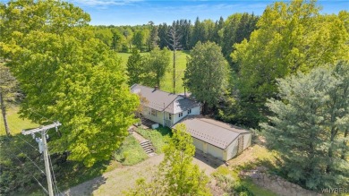 Set in the hills of Collins, this delightful Ranch is situated on Gowanda Country Club in New York - for sale on GolfHomes.com, golf home, golf lot
