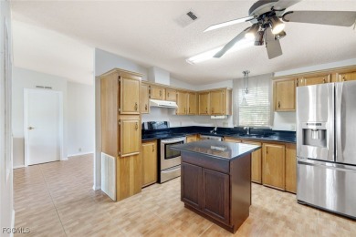 This spacious 3 bedroom & 2 bath home sits on your own lot and on Pine Lakes Country Club in Florida - for sale on GolfHomes.com, golf home, golf lot