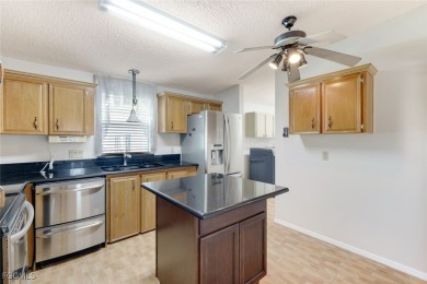 This spacious 3 bedroom & 2 bath home sits on your own lot and on Pine Lakes Country Club in Florida - for sale on GolfHomes.com, golf home, golf lot