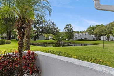 RARE OPPORTUNITY!  End-Unit Townhome with First-Floor Primary on Northdale Golf and Tennis Club in Florida - for sale on GolfHomes.com, golf home, golf lot
