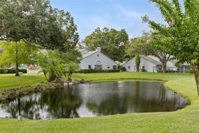 RARE OPPORTUNITY!  End-Unit Townhome with First-Floor Primary on Northdale Golf and Tennis Club in Florida - for sale on GolfHomes.com, golf home, golf lot