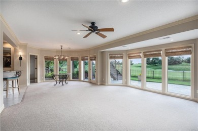 This exquisite 4 bed/4.5 bath home is perfectly placed on the #7 on Nicklaus Golf Club At LionsGate in Kansas - for sale on GolfHomes.com, golf home, golf lot