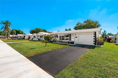 Fabulous Affordable South Florida Home in a lovely quiet 55+ on Leisureville Community Association in Florida - for sale on GolfHomes.com, golf home, golf lot