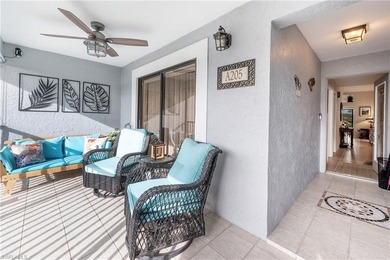 Spectacular lake and golf course view from glassed in lanai. 2 on Countryside Golf and Country Club in Florida - for sale on GolfHomes.com, golf home, golf lot