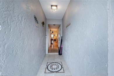 Spectacular lake and golf course view from glassed in lanai. 2 on Countryside Golf and Country Club in Florida - for sale on GolfHomes.com, golf home, golf lot