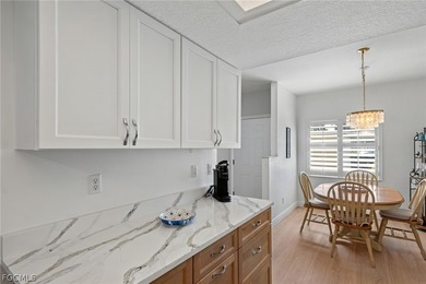 Enjoy peaceful golf course and lake views from this first floor on Breckenridge Golf and Country Club in Florida - for sale on GolfHomes.com, golf home, golf lot