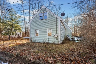 In need of renovations, this property has incredible potential on Cape Arundel Golf Club in Maine - for sale on GolfHomes.com, golf home, golf lot