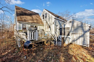 In need of renovations, this property has incredible potential on Cape Arundel Golf Club in Maine - for sale on GolfHomes.com, golf home, golf lot