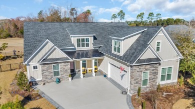 Welcome to the epitome of modern living in this impeccably on Wild Wing Plantation in South Carolina - for sale on GolfHomes.com, golf home, golf lot