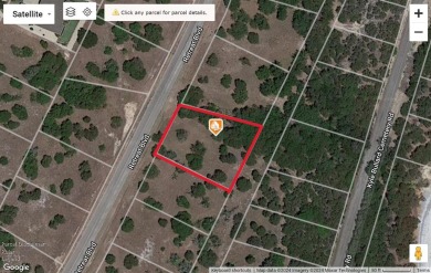 Build your dream home on a highly desirable heavily treed one on The Retreat in Texas - for sale on GolfHomes.com, golf home, golf lot