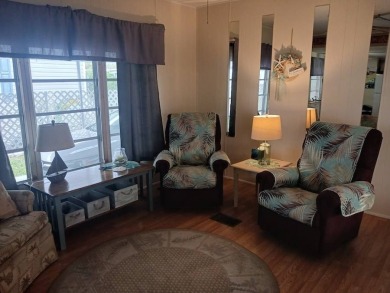 Charming 2 bedroom/2 bath split floor plan with furnished on Sara Bay Country Club in Florida - for sale on GolfHomes.com, golf home, golf lot
