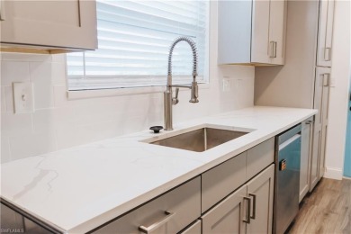 Step into your own slice of Southwest Florida paradise with this on Audubon Country Club in Florida - for sale on GolfHomes.com, golf home, golf lot