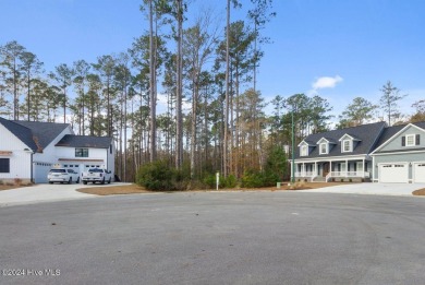 This spacious 1.48-acre lot is perfectly situated in a on Carolina Colours Golf Club in North Carolina - for sale on GolfHomes.com, golf home, golf lot