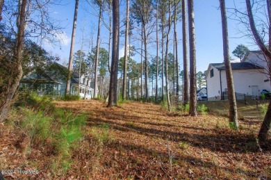 This spacious 1.48-acre lot is perfectly situated in a on Carolina Colours Golf Club in North Carolina - for sale on GolfHomes.com, golf home, golf lot