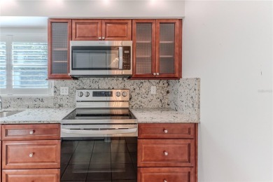 Under contract-accepting backup offers. Charming 2-Bedroom on Timber Pines Golf Course in Florida - for sale on GolfHomes.com, golf home, golf lot