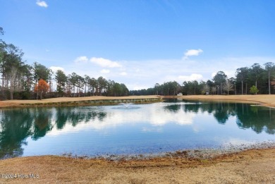 This spacious 1.48-acre lot is perfectly situated in a on Carolina Colours Golf Club in North Carolina - for sale on GolfHomes.com, golf home, golf lot